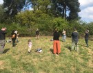 Singing and tree planting at Wild Rumpus site