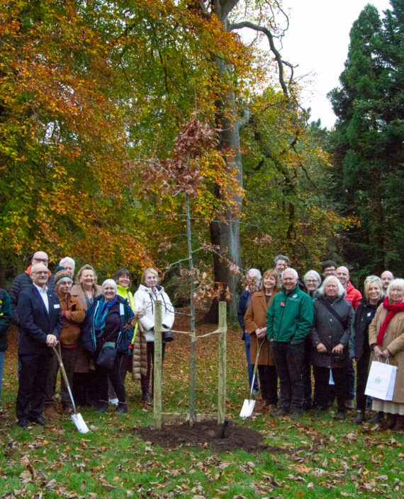 Image of people at tree planting event at Calderstone Park